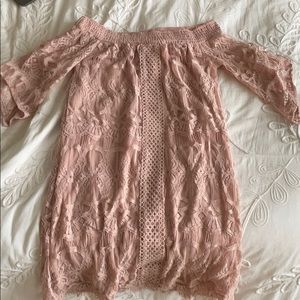 Light pink off the shoulder dress.